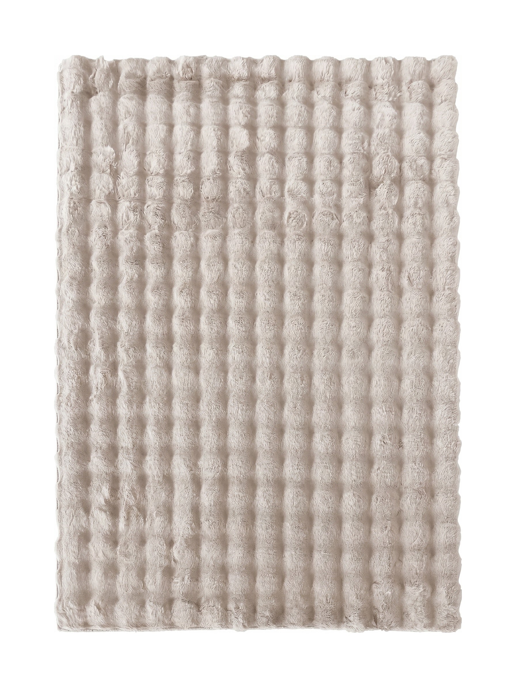 Tapis rectangulaire beige clair texturé avec des motifs ronds en relief, donnant une impression de douceur moelleuse