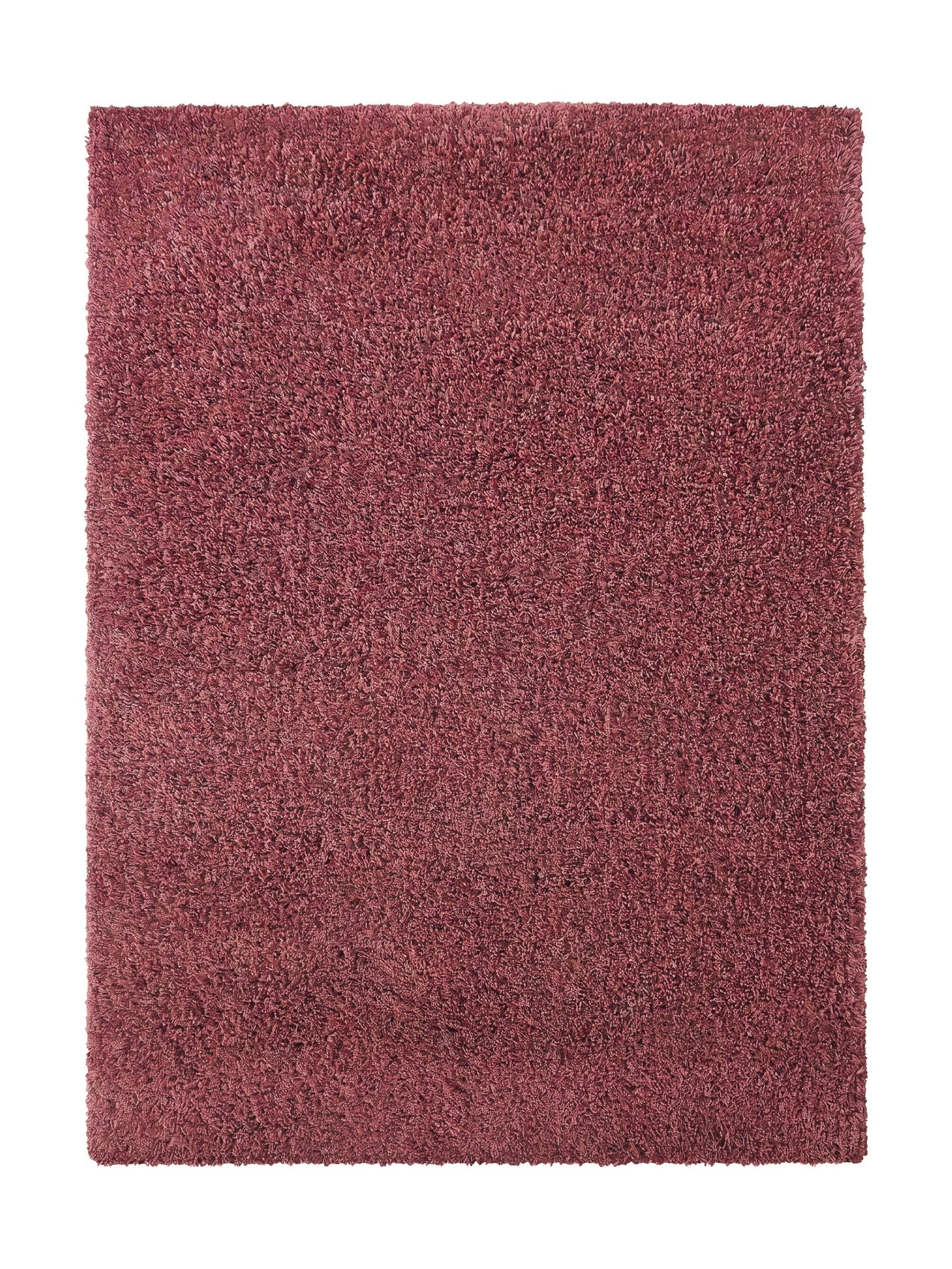 Tapis rectangulaire à poils longs de couleur vieux rose, présentant une texture douce et dense