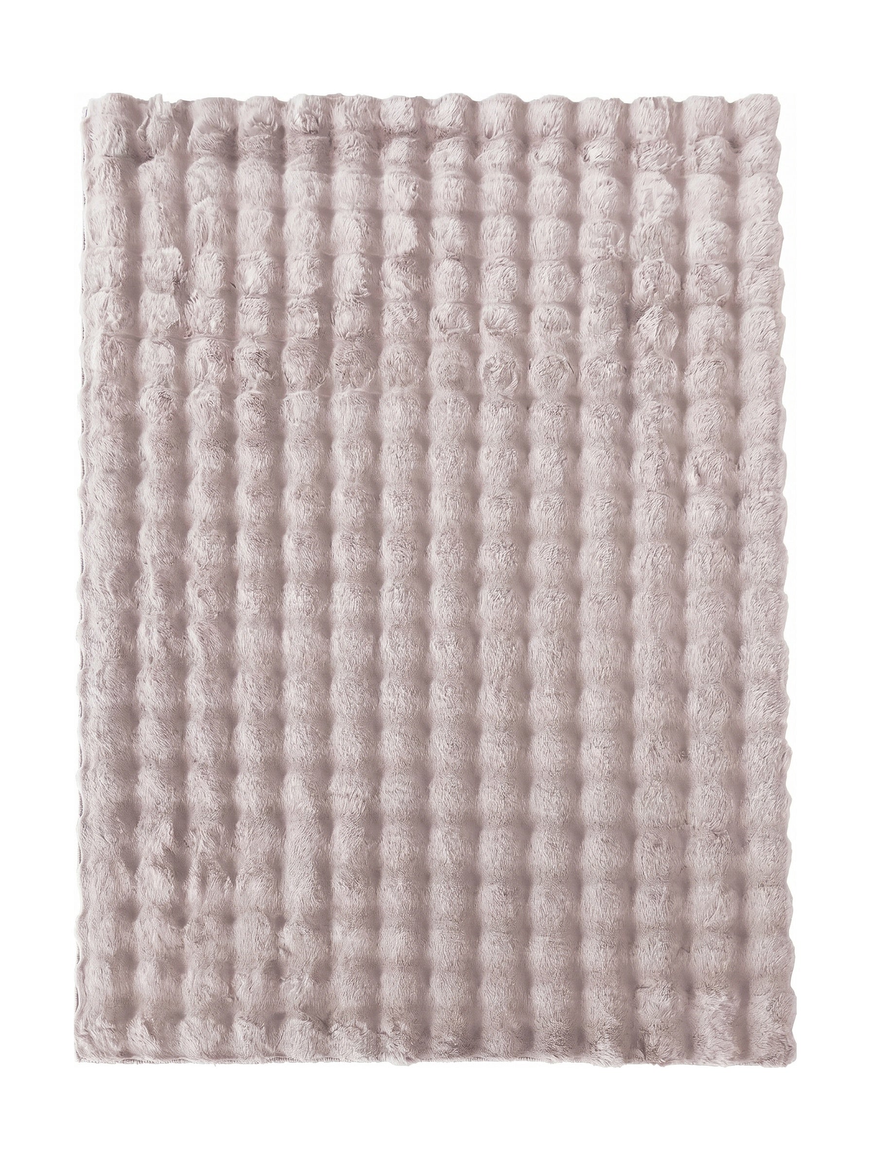 Tapis rose poudré en textile doux et moelleux, présentant un motif régulier de bulles en relief