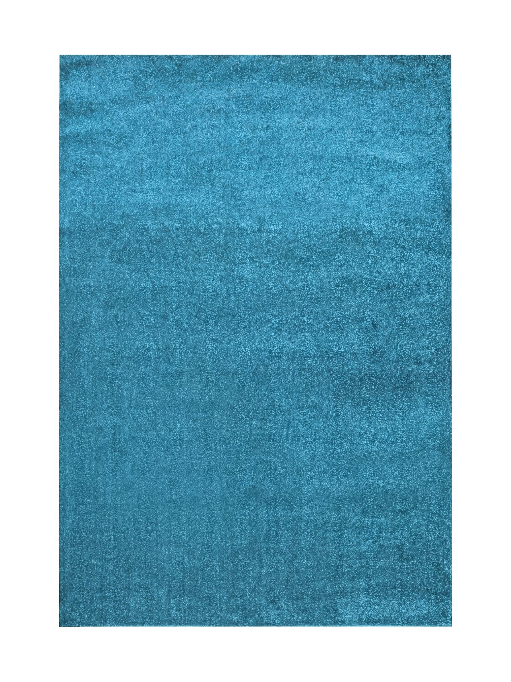 Tapis rectangulaire turquoise avec une texture douce et dense de type shaggy ou effet fourrure