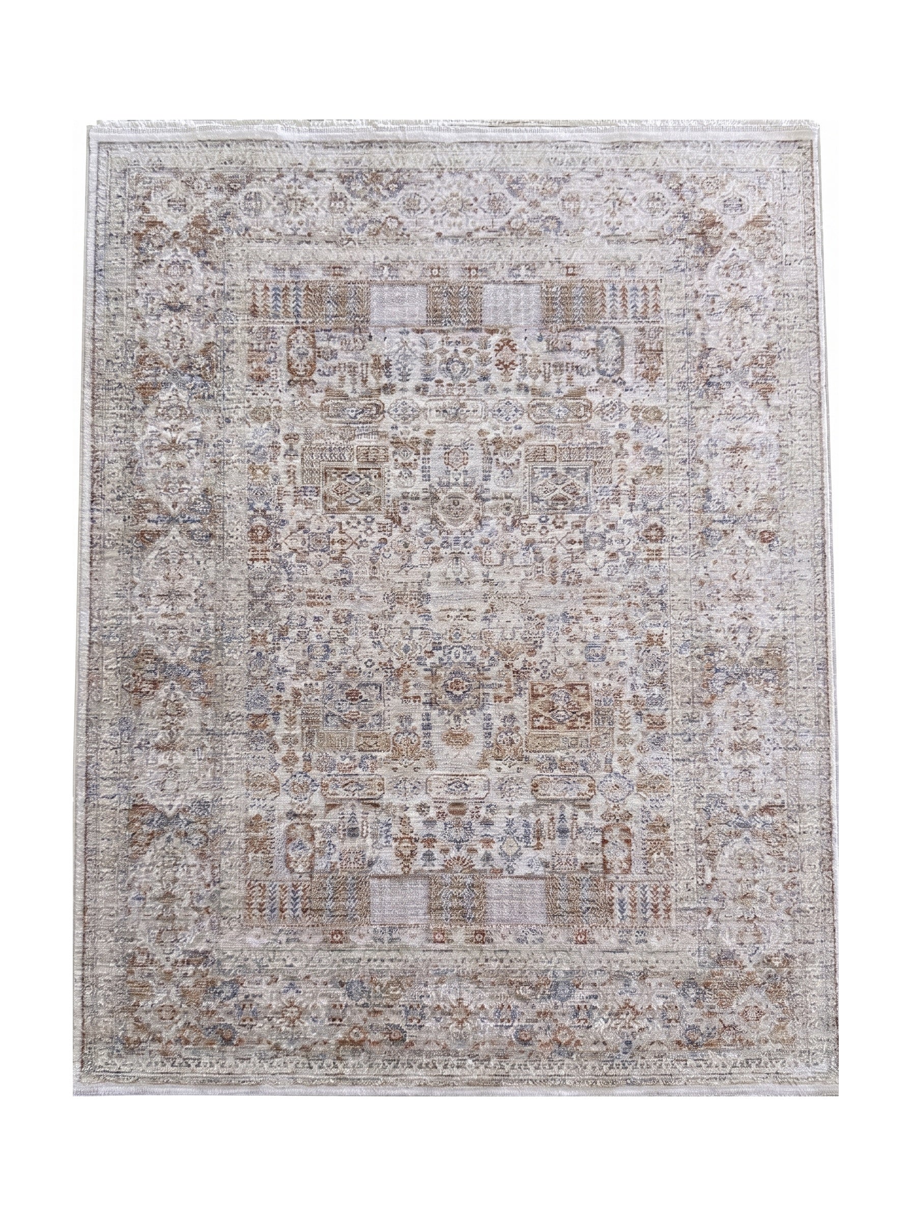 Grand tapis rectangulaire aux motifs traditionnels et géométriques beige crème, marron rouille et bleu gris, avec des franges