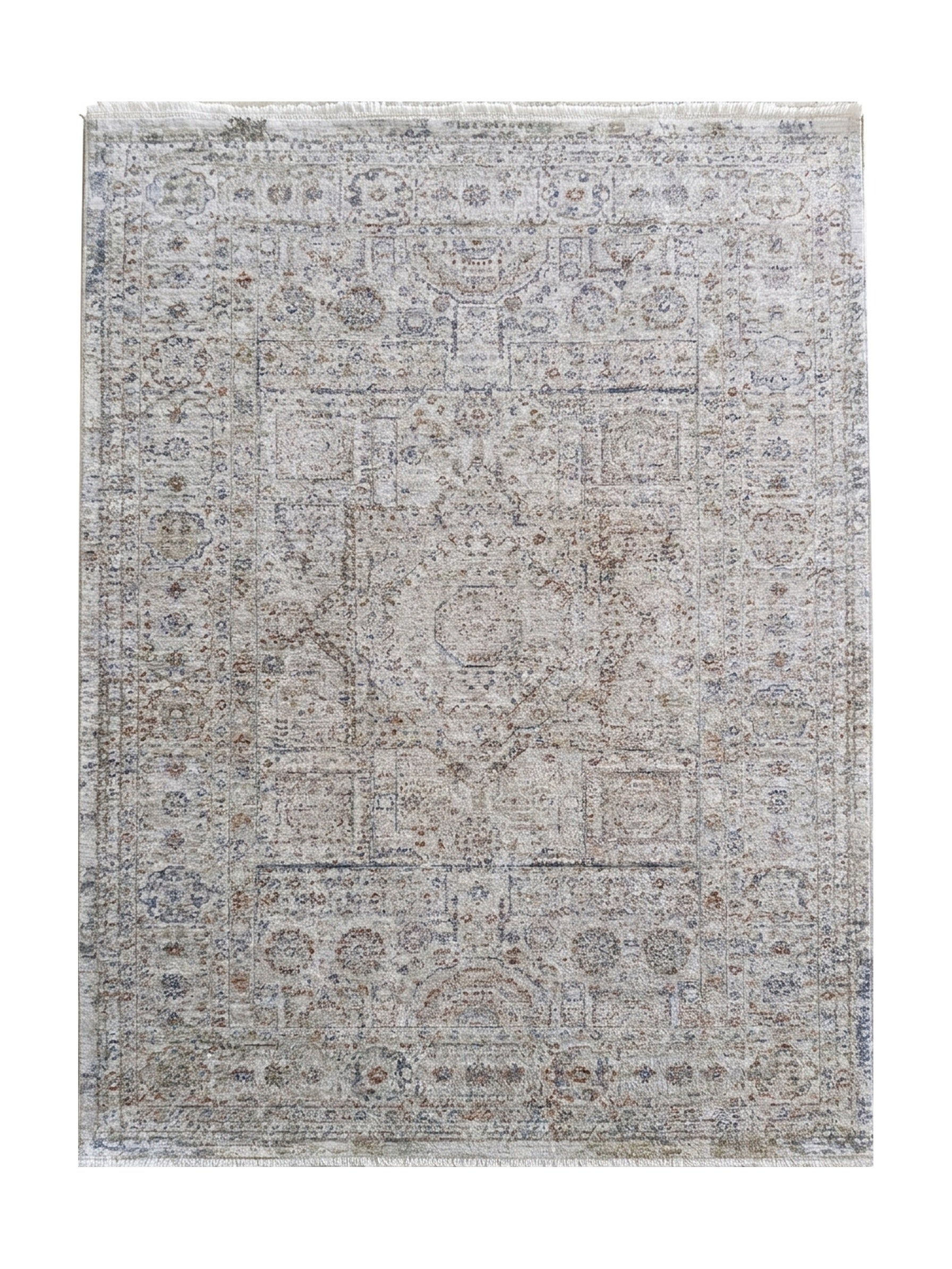 Tapis gris-beige clair aux motifs traditionnels floraux et géométriques délavés bleus, rouille et gris, à franges