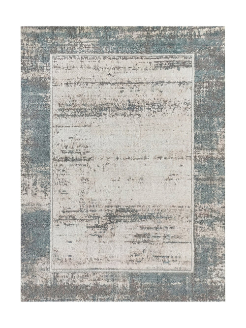 Tapis rectangulaire aux motifs abstraits, avec un centre clair crème et gris et une bordure plus foncée bleu-vert et grise, effet usé