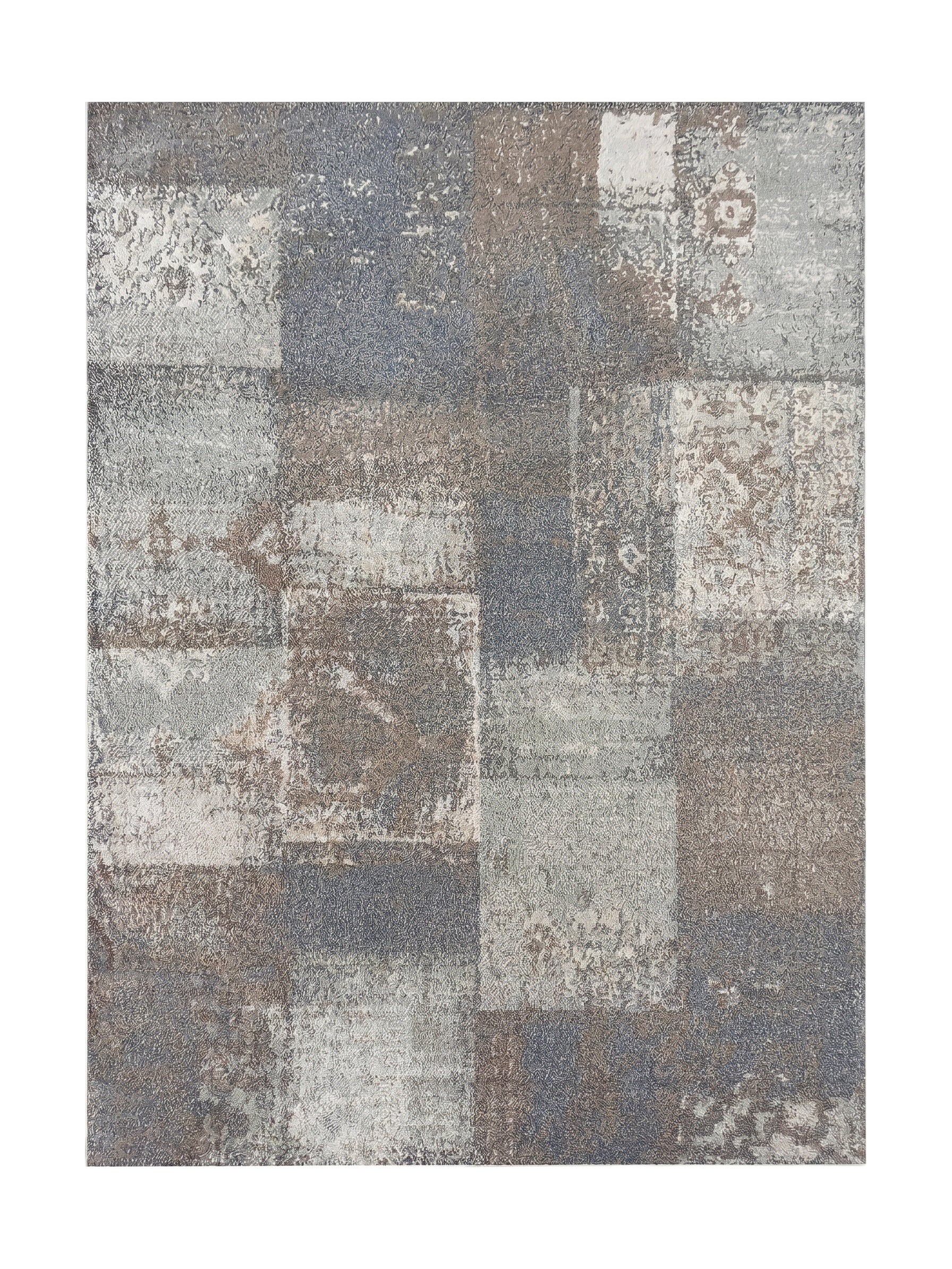 Tapis texturé aux motifs patchwork, combinant des carrés gris clair, bleus et marron avec des détails vieillis