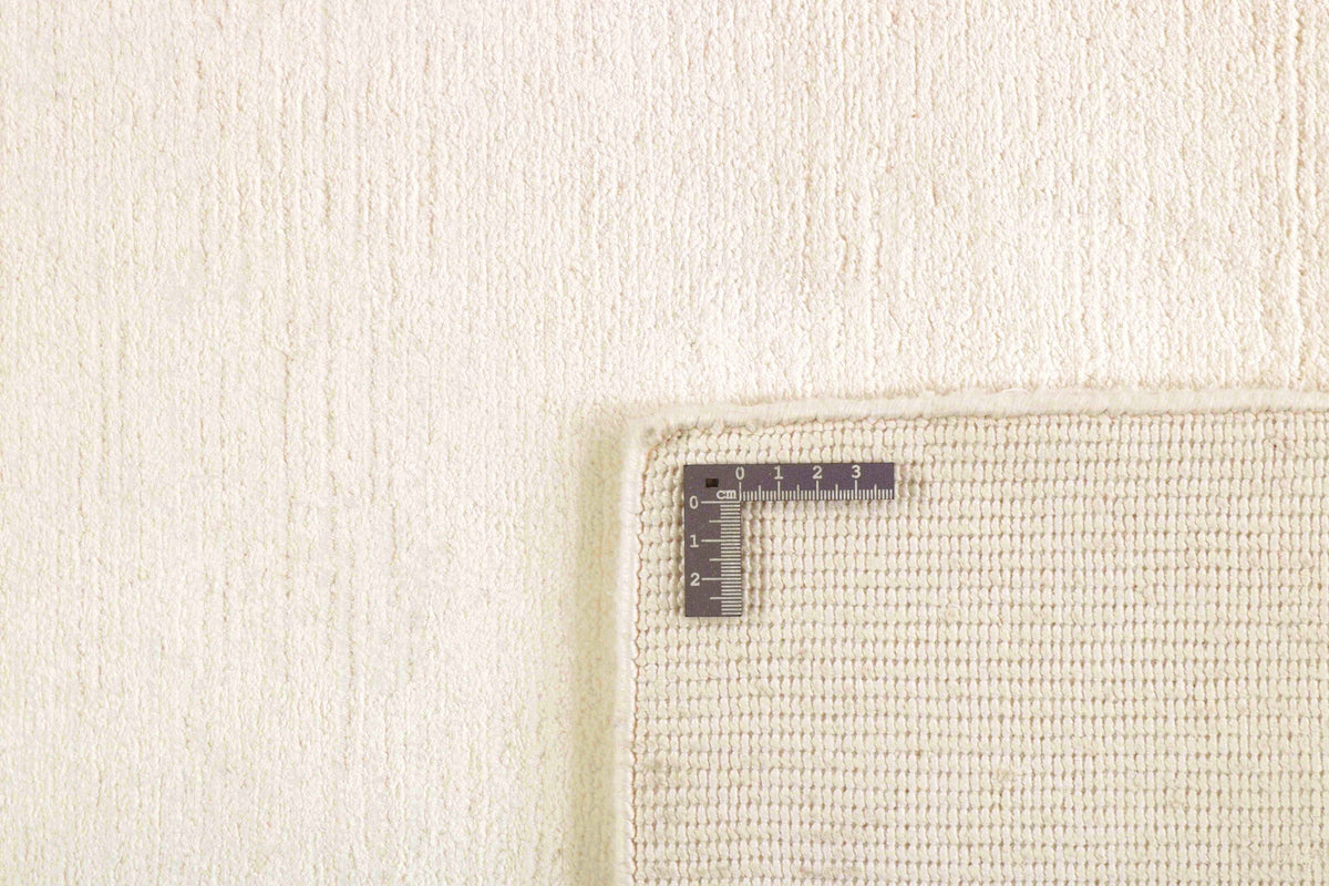Tapis Viscose Ivoire - Riflesso, gros plan sur la texture